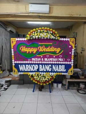Papan Bunga di Tugu Lelea